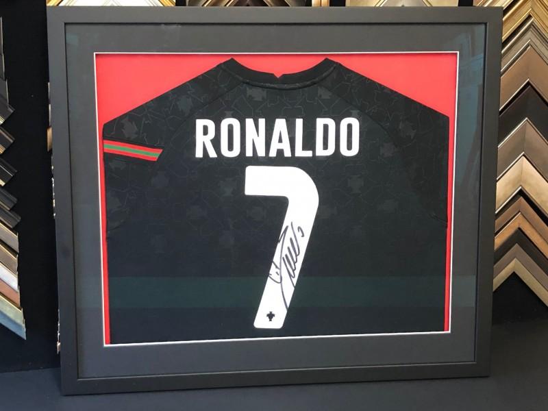 Portugal shirt signed by Ronaldo, framed with a Matt black moulding, mounted and glazed with Tru Vue ready control glass.
