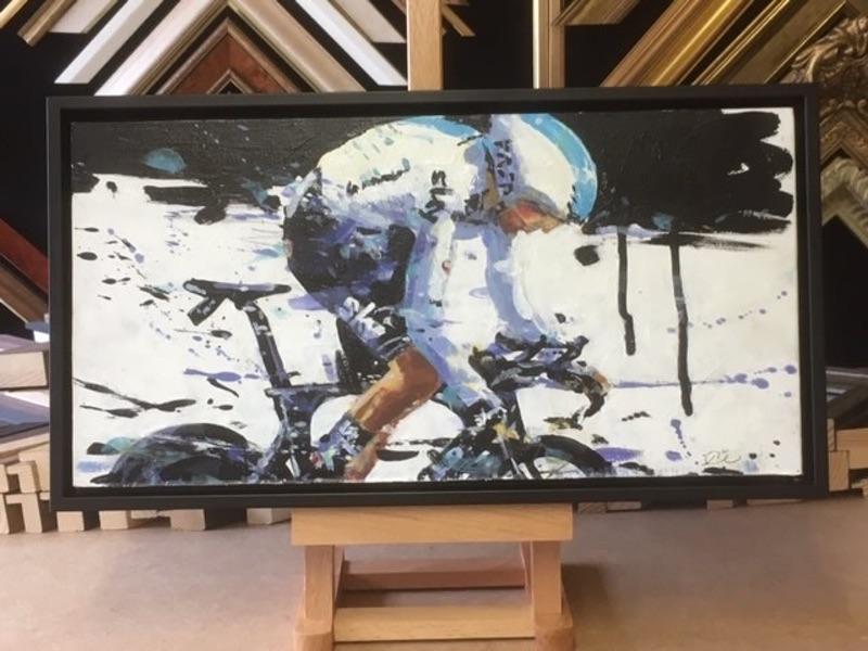 Cyclist oil painting framed in floating box frame